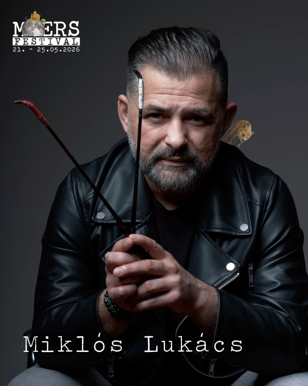 Man in a black leather jacket against a dark grey background. The Moers Festival logo is in the upper left corner. The name "Miklós Lukács" is at the bottom.