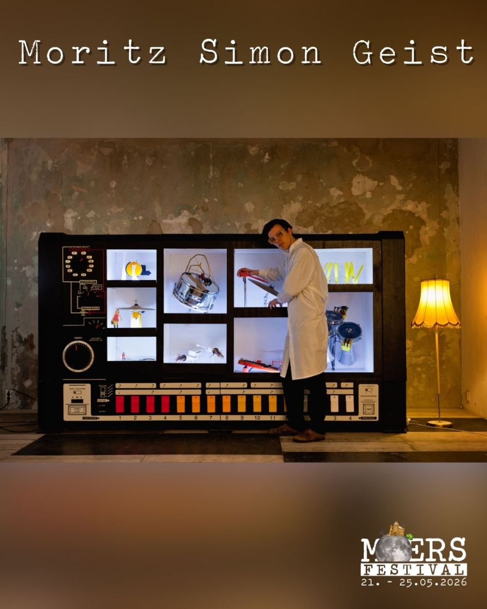 A man wearing a lab coat and safety glasses stands in front of a machine. Above him is the artist's name "Moritz Simon Geist," and in the lower right corner is the logo of the Moers Festival.